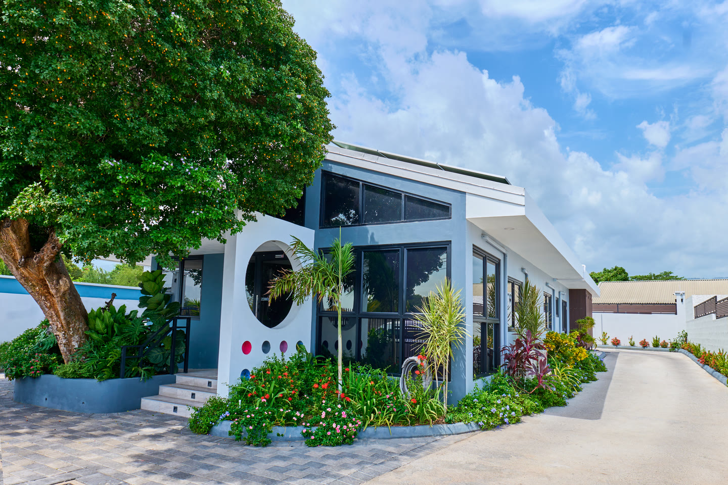 Exterior of Ardenne Medical, with its entrance and landscaped grounds.